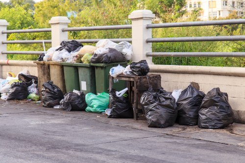 Eco-friendly waste disposal process with a skip in Yiewsley.